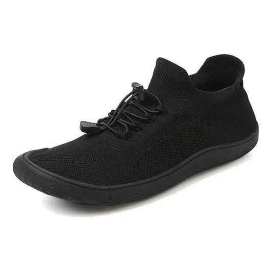 Black lightweight barefoot shoes with a breathable mesh upper and stylish design for comfort.