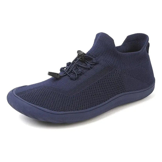 Navy blue Roamers lightweight barefoot shoes designed for comfort and natural foot shape with a ground-connected sole.