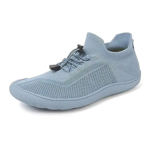 Lightweight barefoot shoes in ice blue, designed for comfort and natural foot shape.