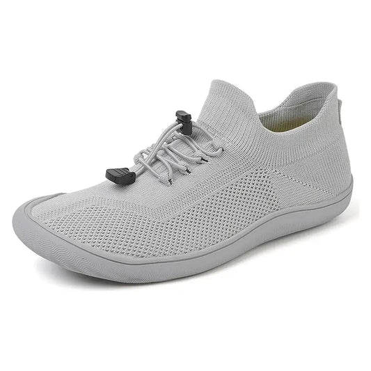 Gray Roamers lightweight barefoot shoes designed for optimal comfort with a flexible fit and breathable material.