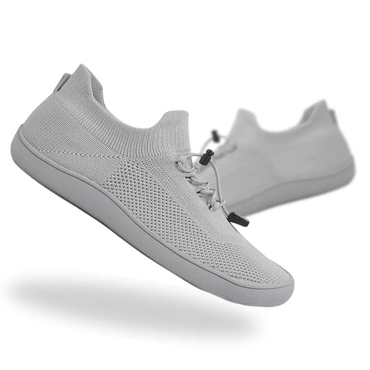 Roamers lightweight barefoot shoes in gray, designed for unmatched comfort and natural foot shape.